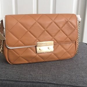 Michael Kors leather shoulder bag w chain strap.